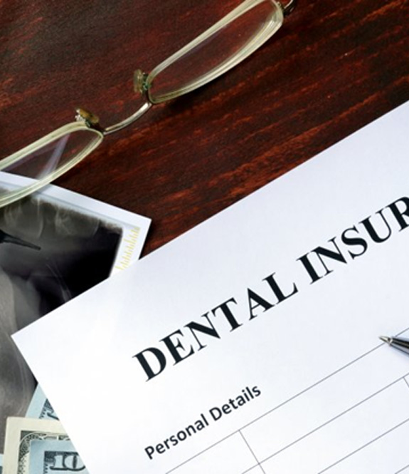 Dental insurance form resting on a desk